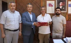 Kocaeli İzmit'te muhtarlara doğum günü ziyareti