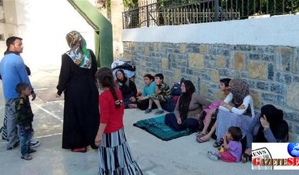 Syrian refugees in Bodrum streets placed in schoolyard